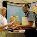 Lowell Jester, right, networks Wednesday with Laura Bennett, corporate recruiter for Tyson Foods, du...