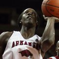 Courtney  Fortson shoots a layup during practice at Bud Walton Arena in Fayetteville.
