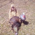 Taylor Smith of Springdale shows a wild turkey gobbler he killed April 11 during the opening weekend...
