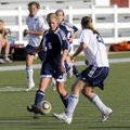 Rogers Heritage junior Liza Eppley, left, pushes upfield as Har-Ber junior Maggie Gartner defends in...