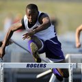  Fayetteville senior Quinton Smith clears the final hurdle on his way to first place in the boys 110...