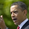 President Barack Obama gestures during a naturalization ceremony for active duty service members in ...