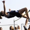  Springdale Har-Ber senior Kirstie Hesseltine clears the bar at 5 feet, 7 inches while competing in ...