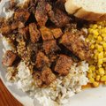  Blackened chicken at R. Landry’s New Orleans Cafe in Fort Smith is served over rice with corn and b...