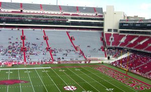 The sun peaks through the clouds on a rainy Saturday prior to Arkansas' Red-White game at Razorback Stadium in Fayetteville.