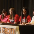 STILL TEAMMATES - Teresa Clement, left, and Sandi Rutherford, right, sign as guardians for their dau...