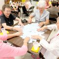 CARD PARTY - Marlys Petersen, from left, Dorleen Kessler, Doris Burwitz and Donna Michener play cana...