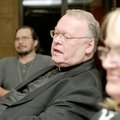 The Rev. Peter Gillquist talks with Rich Ratliff, Julia Campbell and others in the lobby of the Unio...
