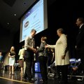 AWARDS OF EXCELLENCE - Rogers High School juniors receive awards Friday for academic excellence at t...