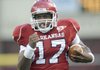 Arkansas quarterback Brandon Mitchell ran 88 yards for a touchdown on his first snap, then threw a 69-yard pass to Greg Childs to set up another score.