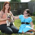 Amy Locke, left, of Farmington and her 10-year-old daughter, Molly, adopted Mona, a 7-month-old beag...