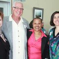  Author Sapphire, second from right, is welcomed to the Fayetteville Public Library on Tuesday by li...