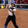 Rogers High’s Ashley Ferguson swings at a pitch during an April 6 game against Rogers Heritage at Ve...
