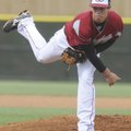 Springdale High’s Chris Huebner pitches during Friday’s game at Bentonville.