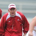 Arkansas Coach Bobby Petrino yells instructions to his players during practice April 21 in Fayettevi...