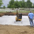 Crews prepare property Friday that will be for crypts at Fayetteville National Cemetery. The Regiona...