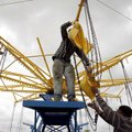  
Fun Time Shows employees Rev. William Pinkard (left) of Malden, Mo., and James Mayweather of Tope...