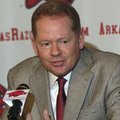 University of Arkansas coach Bobby Petrino talks with reporters about the new football recruits duri...