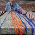 Joe Weatherford of Fayetteville untangles leashes Monday while volunteering at the Fayetteville Anim...