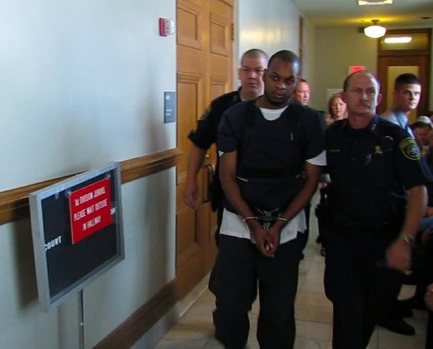 abdulhakim-muhammad-is-led-from-the-courtroom-after-a-hearing-on-april-27