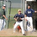 Shiloh Christian second baseman Kyler Offenbacker looks toward the mound while covering first base a...