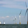  In this July 11, 2006 file photo, a vessel sails towards a wind farm off the coast of Whitstable on...