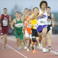 Fayetteville’s Tevin Whitney begins the final lap while leading the field in the 800 meters on his w...