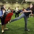 Bernice Young Elementary School students Jordan Knipe, right, and Chloe Mangham, both 10, participat...