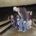 Second-graders from Bellview Elementary School in Rogers marvel at the interior of War Eagle Cavern ...