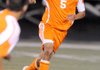 Rogers Heritage’s Phillip Amaya moves the ball downfield against Rogers High on April 16 at Heritage.