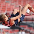  Kirstie Hesseltine of Springdale Har-Ber clears the bar at 5 feet, 8 inches, to win the high jump c...