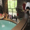  Gamble students tour inside the Applegate House. The home was designed by Fay Jones and there are n...