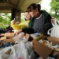 BENEVOLENCE - Sherri Calverley, left, and Kim Fort, volunteers for Northwest Arkansas Hope Center, a...
