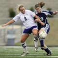 Rogers Heritage’s Ricki Kimball, right, fights for the ball with Mount St. Mary’s Chloe Davenport du...