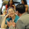  Michelle Chavez, a partnership specialist with the U.S. Census Bureau, speaks Friday with the Rev. ...