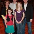 Budding comedienne Maggie Palmer, second from left, is joined by her family after her performance at...