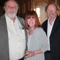 Sponsor party host Bruce Johnson, left, visits with Washington Regional Hospice supporters Margaret ...