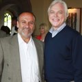 Co-host of the May 22 Hospice Garden Party Fadil Bayyari, left, talks with Bill Rogers on Tuesday at...
