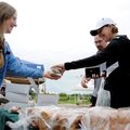 IN THE MARKET - Kim Weyhrich, left, with Olde Tyme Bakery hands Paula White and Mark Hoffman, both o...