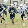 Northwest Arkansas Knights defenders put pressure on Edmond, Okla., middleman Jack Courtney, right, ...