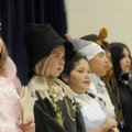 Grace Hill Elementary School fifth-graders Tori Schmitt as Glenda the Good Witch, from left, Austin ...