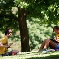 Sophomore Caleb Markovich from Siloam Springs and freshman Caitlyn Swain from Russellville study for...