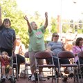  Kim Butler of Fayetteville, left, worships alongside Linda Zebell of Winslow, Diane Smith of Greenl...