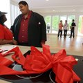 Quincy and Stephanie Scott tour their new home at 1519 S. Commerce Street in Little Rock after a rib...