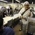 SAUCE BOSS’ GUMBO GROOVE - Bill Wharton of Monticello, Fla., takes a break Friday from playing music...