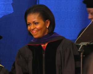 Michelle Obama stands on stage as the UAPB commencement ceremony ...