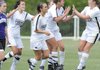 Bentonville senior Hannah Nilsson, center, is congratulated after scoring a second-half goal during Saturday’s game.