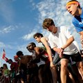  Shane Stroinski, from right, and Austin Hayes line up Saturday with other runners before the start ...
