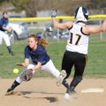  Springdale Har-Ber shortstop Aston Long, left, fields the throw from the plate before tagging out P...
