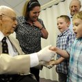  Bill Wanamaker, left, greets his great-grandchildren Wesley Martin, 5, right, and Drake Martin, 7, ...